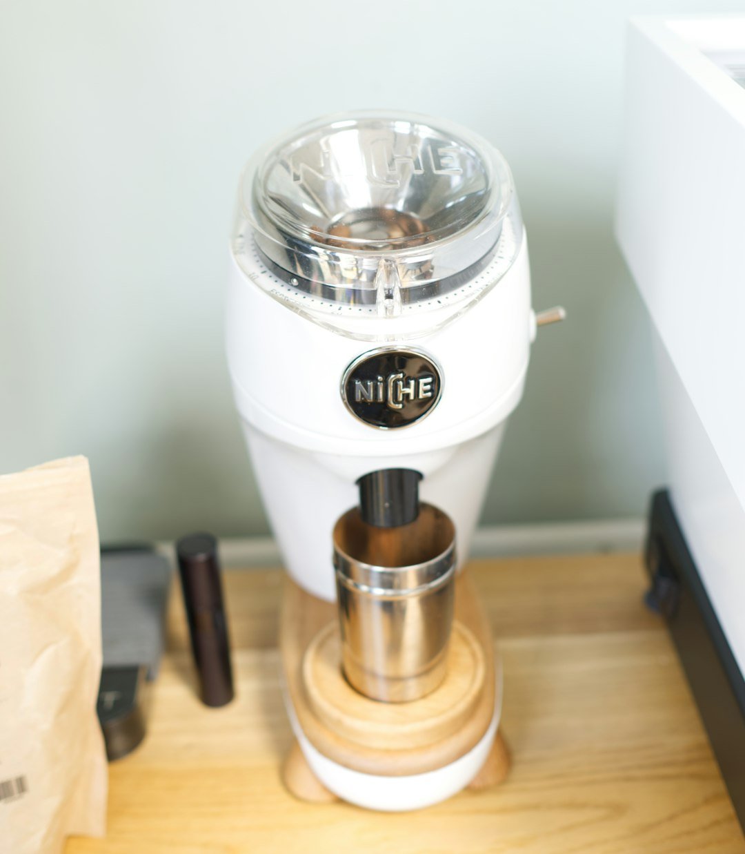 Modern white coffee grinder ready for home use